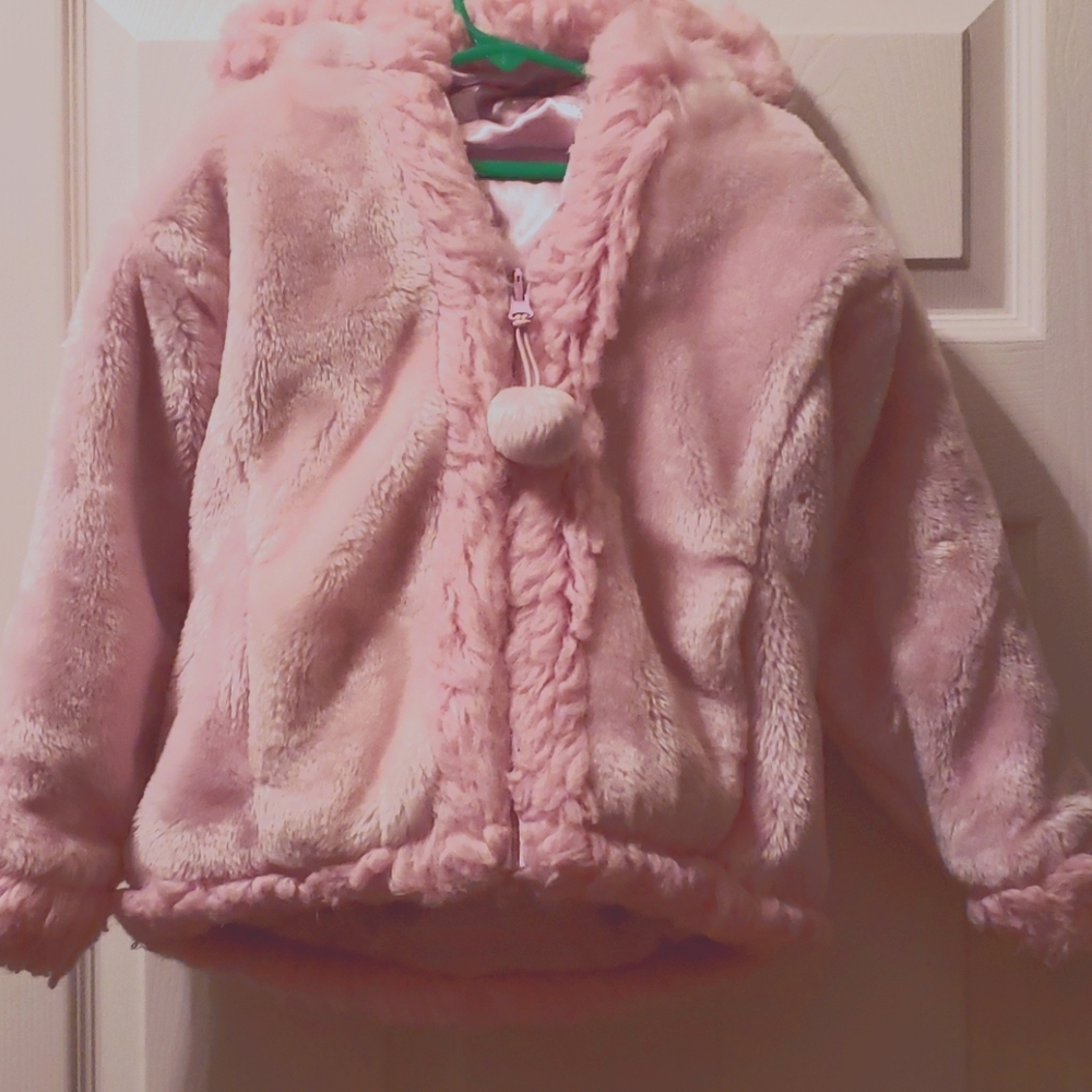 Girls pink reversible coat with hood.